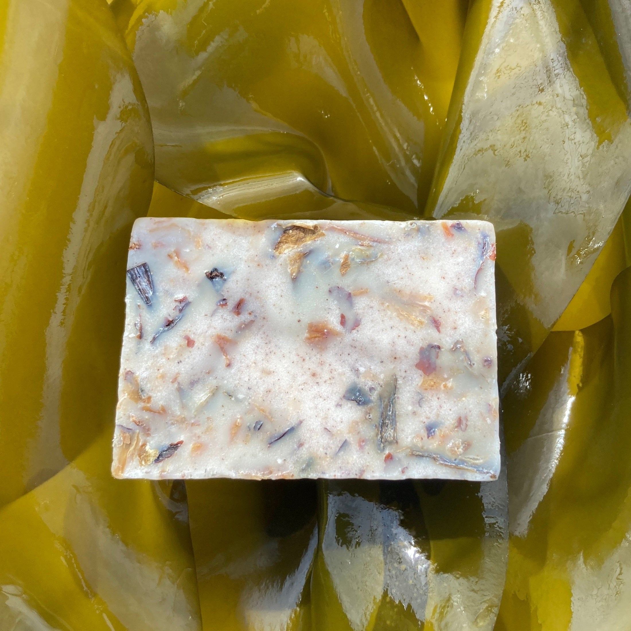 Oatmeal body bar on fresh seaweed