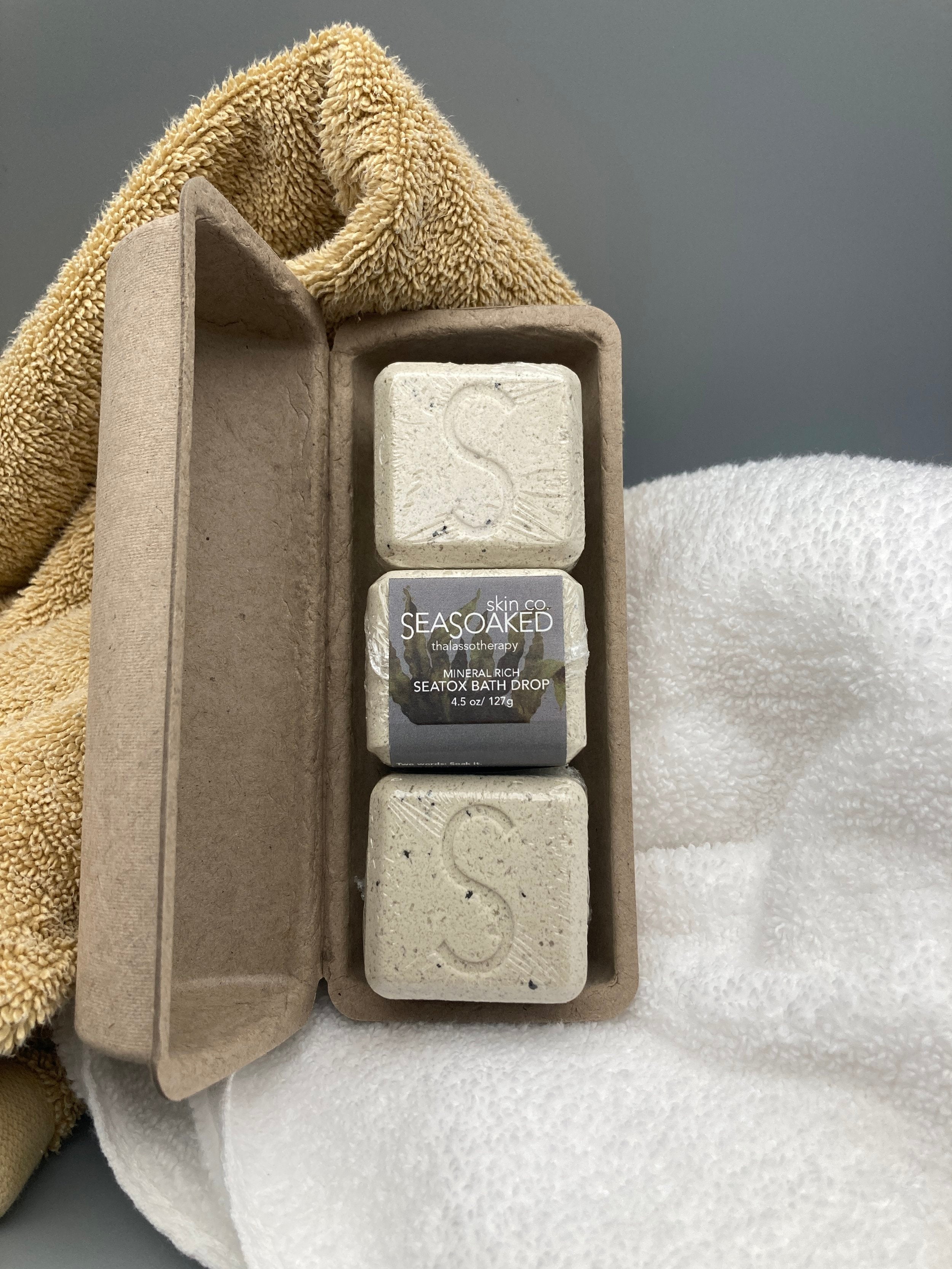 Open package showing three Seatox Bath Drops.