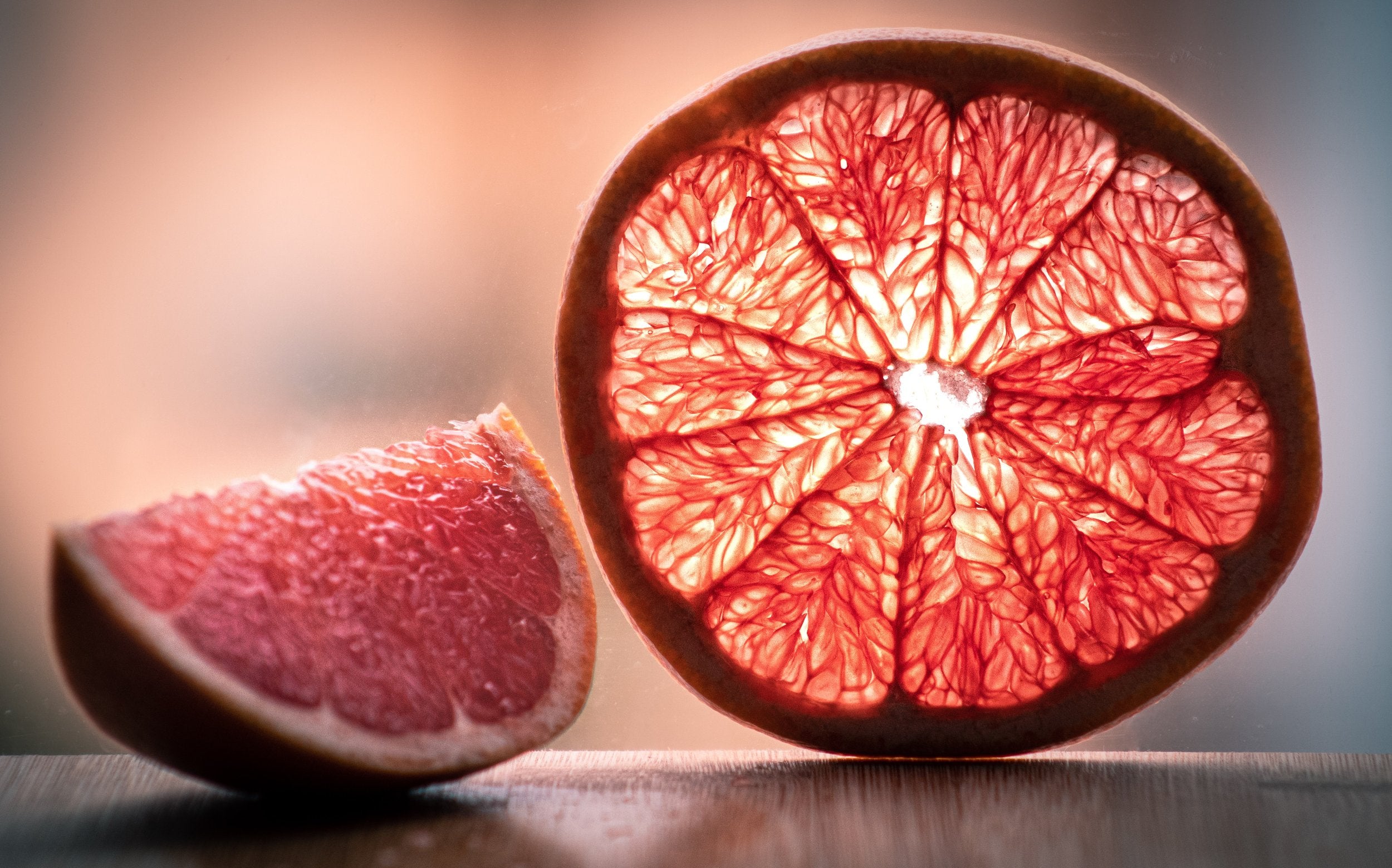 Sunlight through slice of blood orange fruit