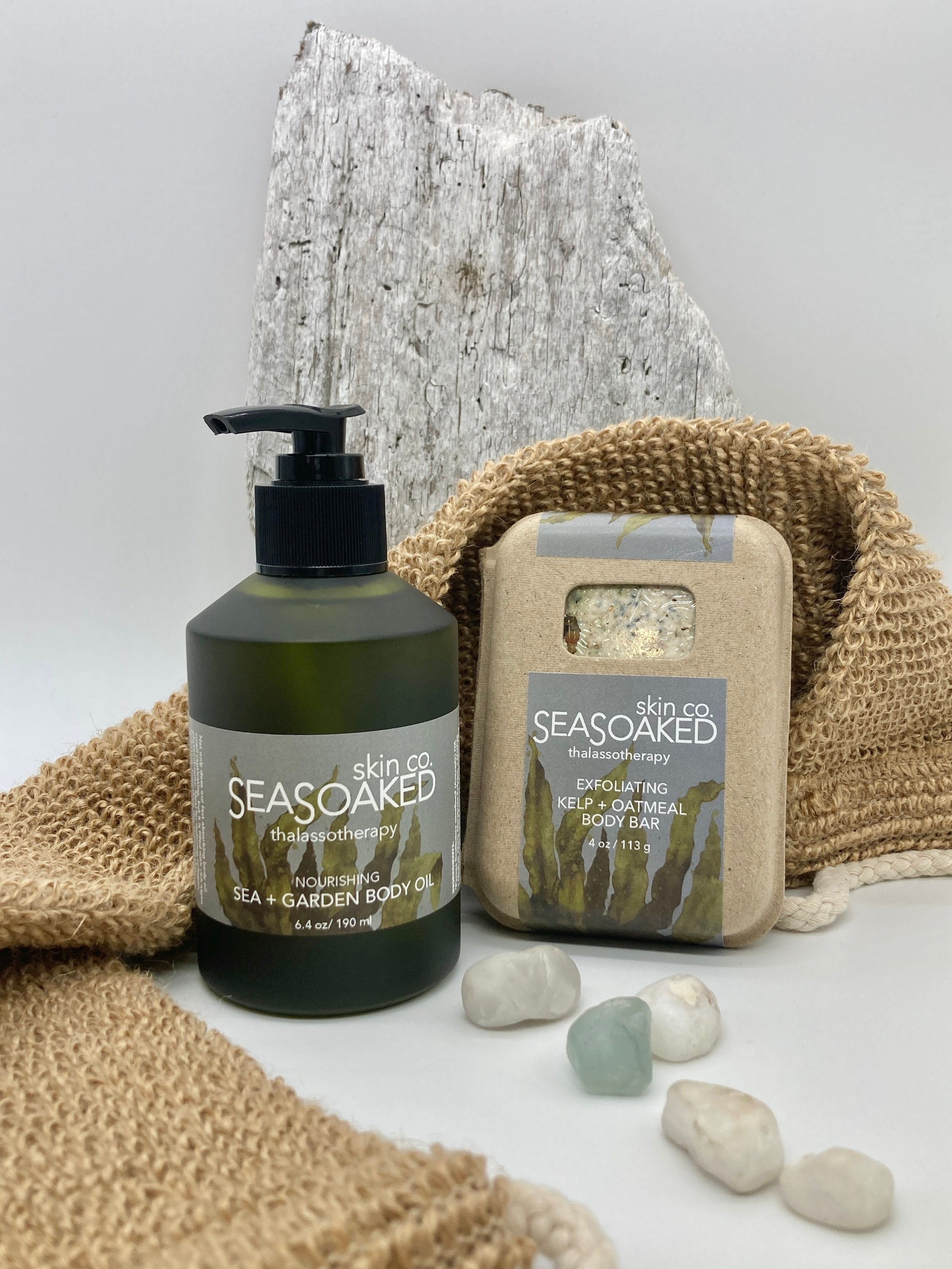 6.4 ounce bottle of Sea + Garden Body Oil and Exfoliating Kelp + Oatmeal Body Bar.
