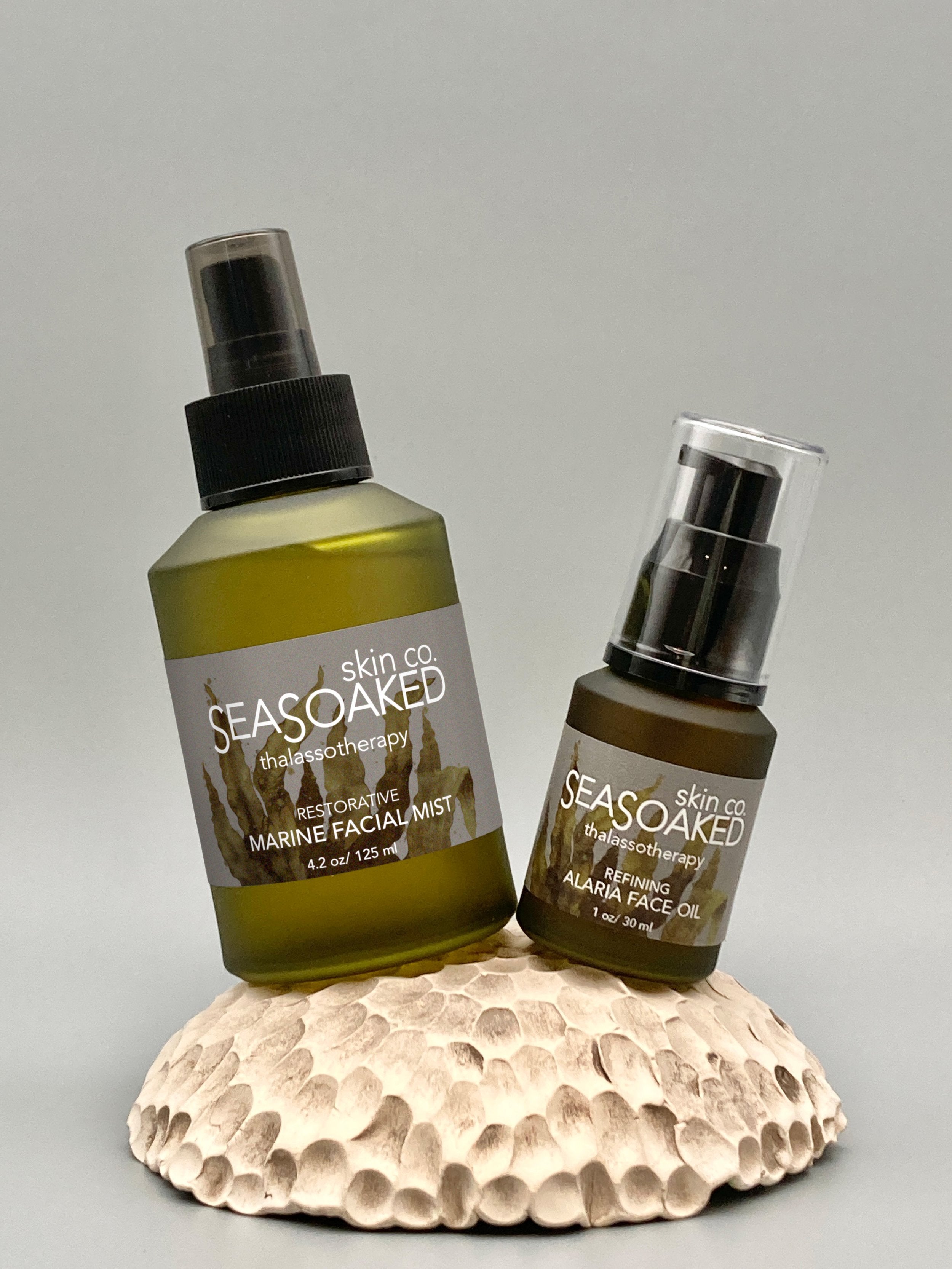 4.2 ounce bottle of Restorative Marine Facial Mist and 1 ounce bottle of Refining Alaria Oil
