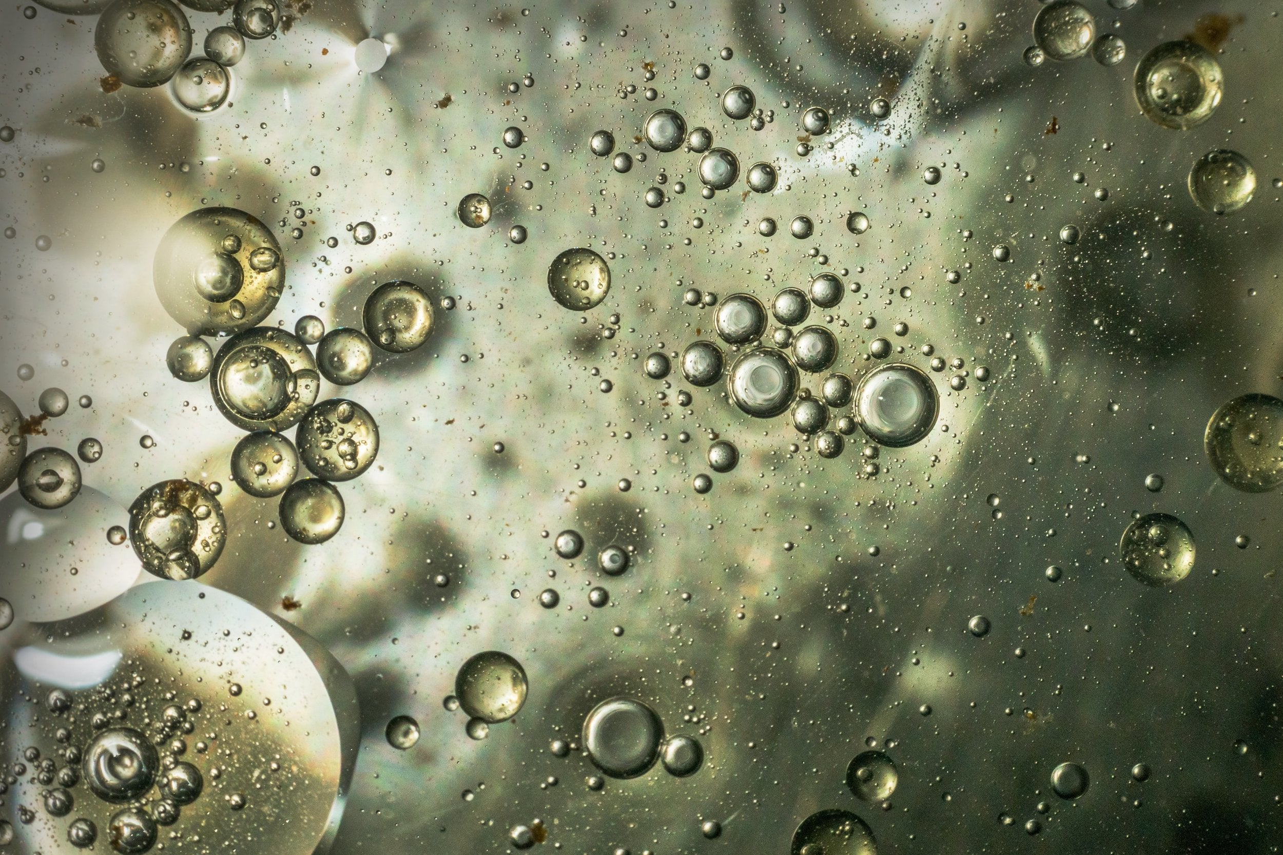 Bubbles in clear green liquid